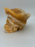 Honey Calcite Skull with Pirate Hat Carving