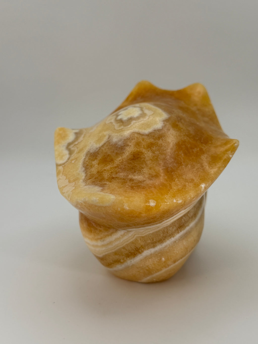 Honey Calcite Skull with Pirate Hat Carving